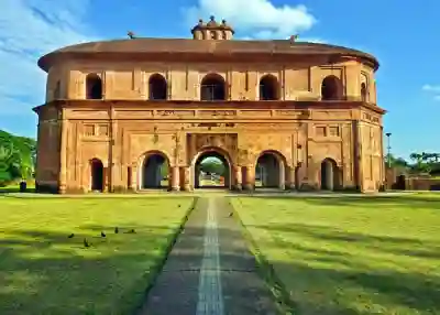 Rang Ghar - a stone building with arches and a walkway